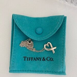 Tiffany & Co. Loving Heart Pendant. 17" Chain
Sterling Silver authentic